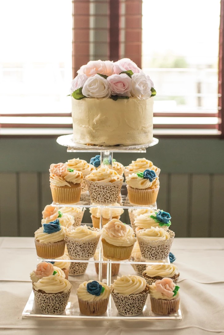 Buttercream cake and cupcake tower with sugar roses